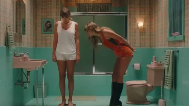 a person standing on a scale in a bathroom